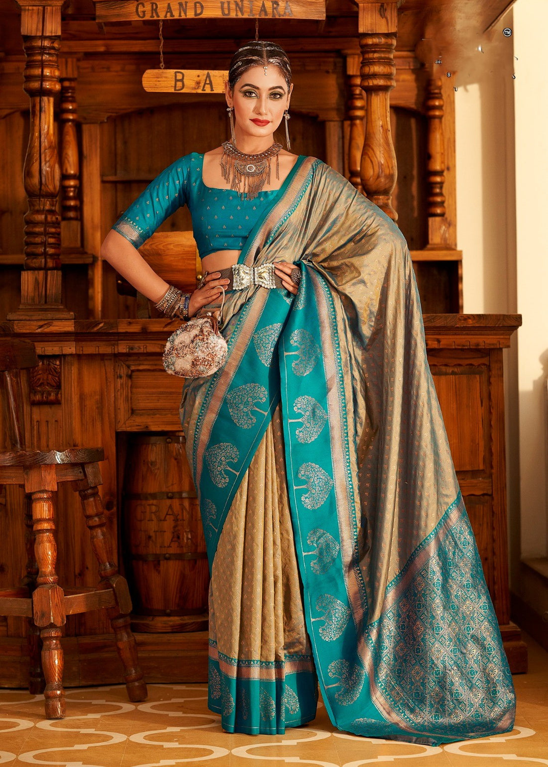 Turquoise paithani with copper zari weave