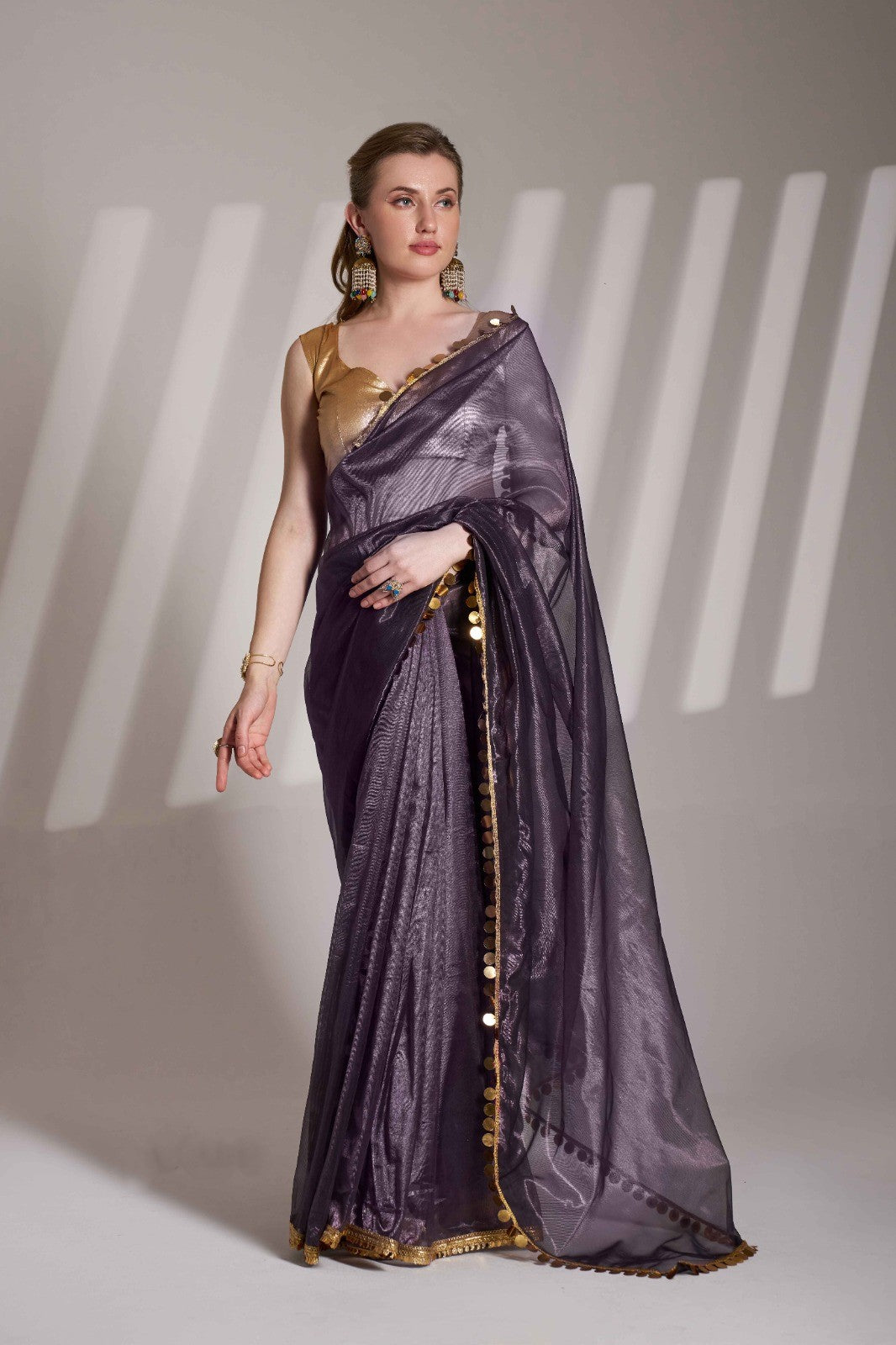 Purple Twill Net Saree With Golden Lace Border