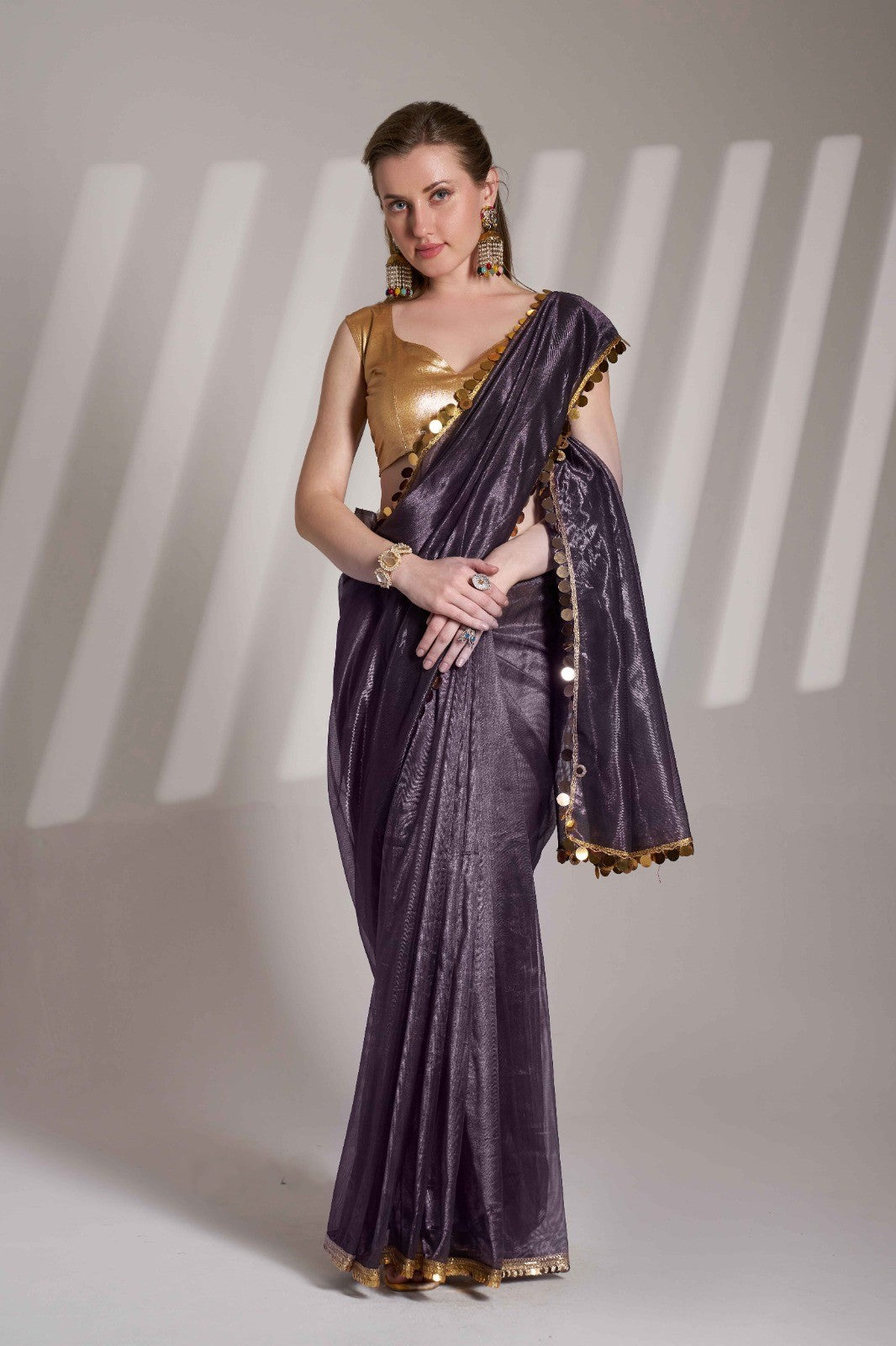 Purple Twill Net Saree With Golden Lace Border