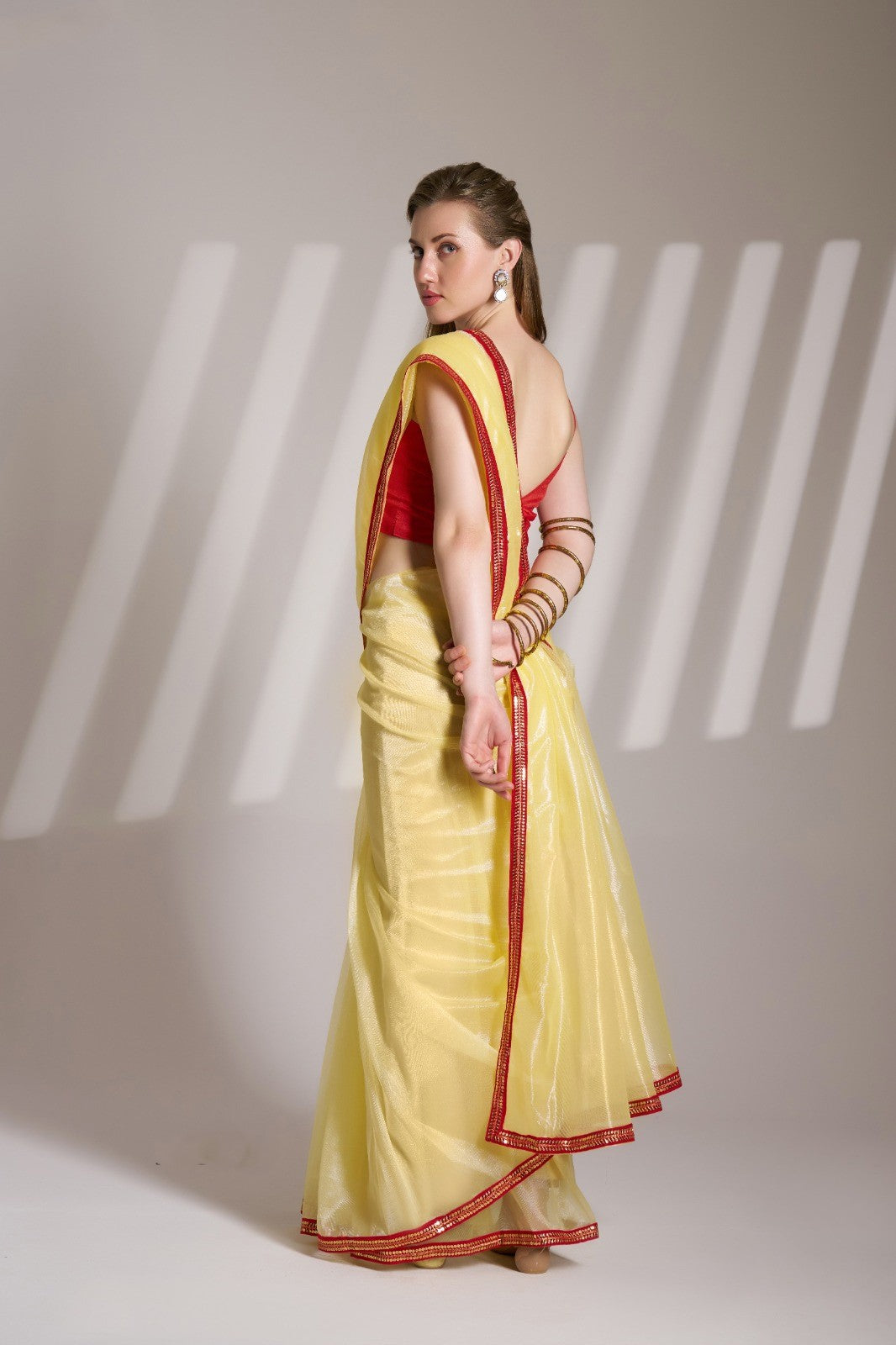 Twill Net Yellow Colour Saree With contrast Lace Border