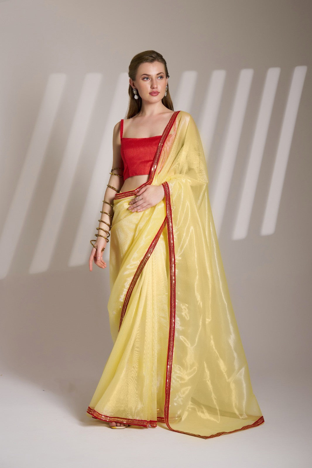 Twill Net Yellow Colour Saree With contrast Lace Border